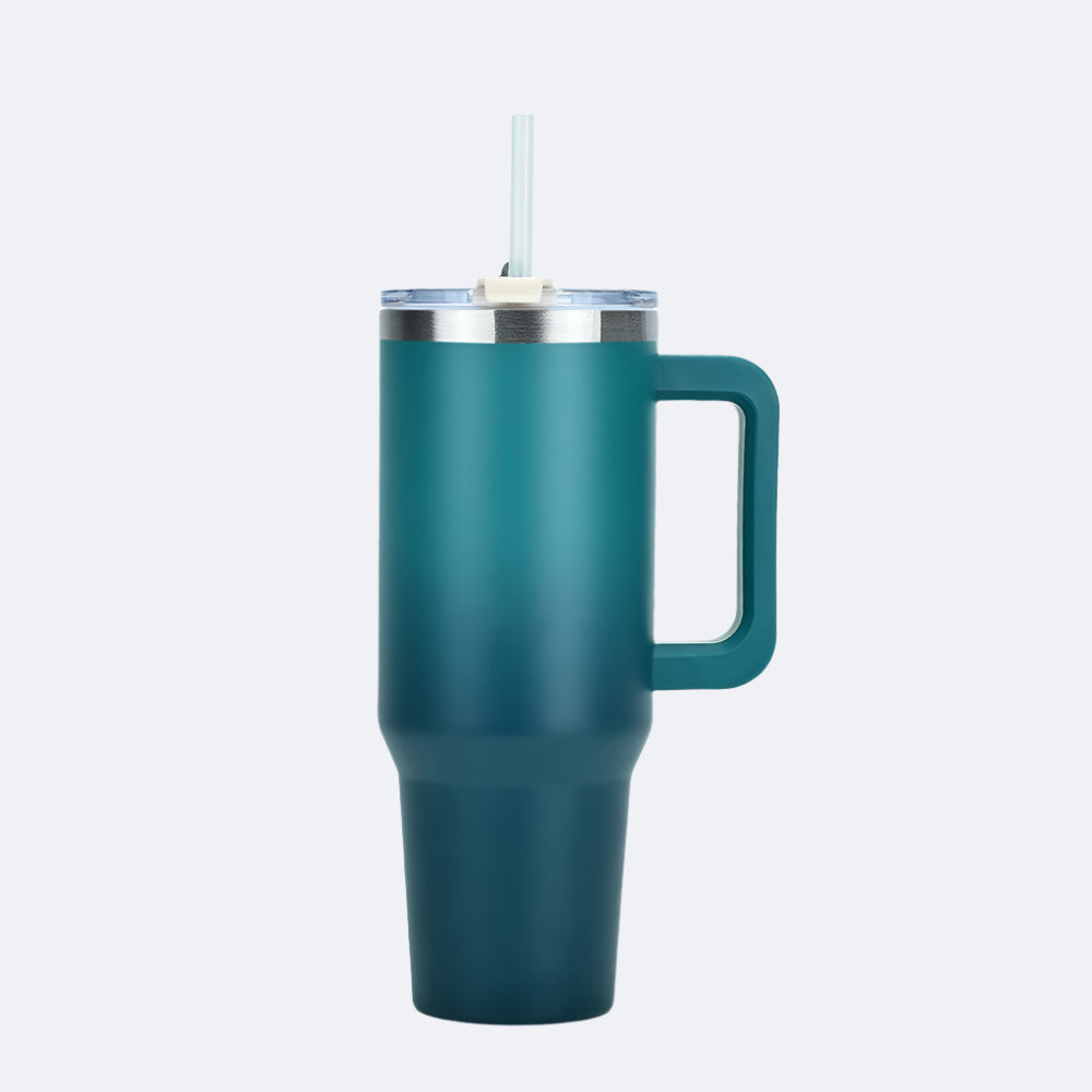 A dark green stainless steel tumbler with a straw lid and handle, displayed against a white background.
