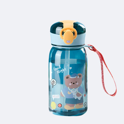 A blue plastic water bottle for kids with a cartoon bear design, featuring a soft PP straw, a durable PC body, and a red carry rope.