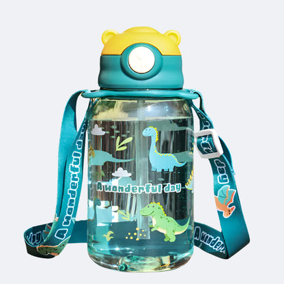 A green water bottle with a cartoon character design, featuring a soft straw and a carry strap